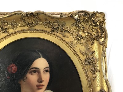 Lot 17 - Victorian English School oil on canvas - oval portrait of a pretty young lady, 41cm x 50cm, in gilt frame