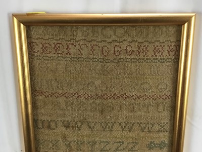Lot 22 - Victorian needlework sampler depicting alphabet, dated 1879, in glazed gilt frame