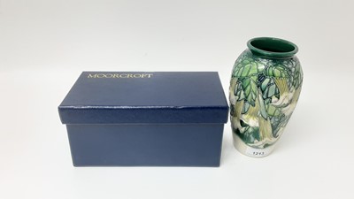 Lot 1213 - Moorcroft pottery vase decorated in the Angels Trumpets pattern, signed Anji Davenport, dated 99, 18.5cm high