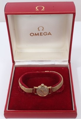 Lot 297 - Ladies Omega 9ct gold wristwatch on gold bracelet, in original box