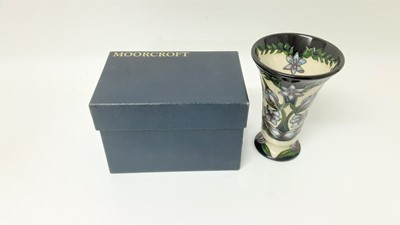 Lot 1218 - Moorcroft pottery vase decorated in the Kaffir Lily pattern, signed Shirley Hayes, dated 2001, 15.5cm high, boxed