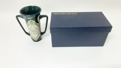 Lot 1219 - Moorcroft pottery Art Nouveau style twin handled vase, 15cm high, boxed