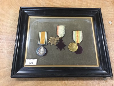 Lot 726 - First World War 1914 - 15 Star Trio comprising 1914- 15 Star, War and Victory medals named to 11104 PTE. G. F. Hawes. C. GDS. mounted in glazed frame.