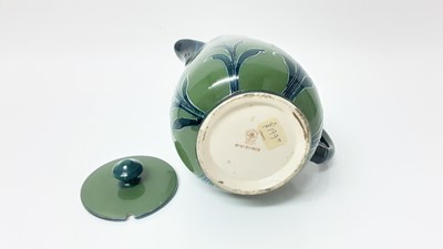 Lot 1234 - Moorcroft MacIntyre chocolate pot decorated in the Forget Me Not pattern, 21cm high