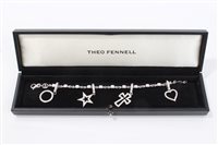 Lot 658 - Theo Fennell diamond and 18ct white gold charm...