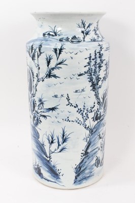 Lot 183 - Large Oriental blue and white porcelain sleeve vase, decorated with landscape scenes