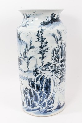 Lot 42 - Large Oriental blue and white porcelain sleeve vase, decorated with landscape scenes