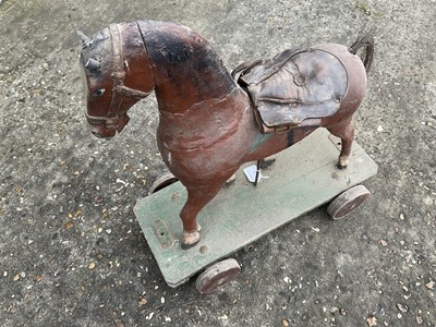 Lot 2 - 19th century child's polychrome painted toy horse, on sledge base and castors, 55cm long