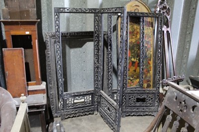 Lot 30 - Late 19th century Chinese carved hardwood four fold screen frame with pierced floral scroll decoration 163 cm high, opening to 224 cm wide