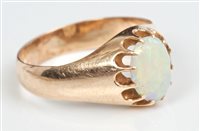 Lot 669 - Russian rose gold and opal single stone ring,...