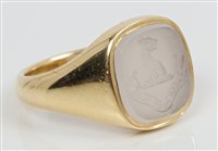 Lot 670 - 1930s armorial gold (18ct) and hardstone...