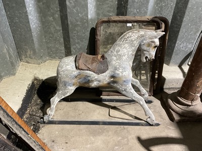 Lot 35 - Victorian carved and painted pine rocking horse with remnants of original saddle ( sub frame lacking ) 104 cm long, 79 cm high