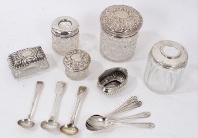 Lot 264 - Silver topped hair tidy, another similar, three silver topped vanity jars, salt cellar and group of silver spoons
