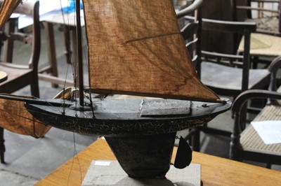 Lot 71 - Antique scratch built pond yacht on stand, total height 104cm