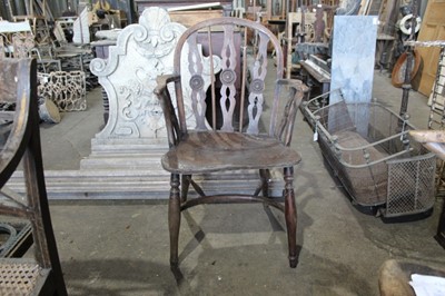 Lot 67 - Early 19th century yew and elm Windsor chair, with roundel moulded back and saddle seat, crinoline stretcher