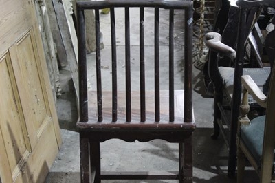 Lot 57 - Chinese hardwood chair, with spindle back and solid seat on moulded legs and stretchers
