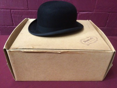 Lot 2234 - Gentleman's Dunn & Co. Bowler hat together with a pair of Moroccan slippers, size 9.