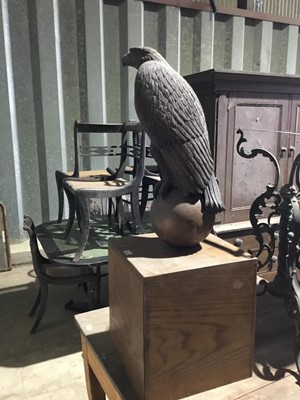 Lot 92 - Finely carved oak eagle, raised on orb and mounted on a wooden box plinth, total height 101cm high