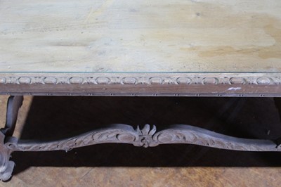 Lot 89 - Baroque style carved pine coffee table, with glass inset top raised on acanthus carved cabriole legs and carved stretchers