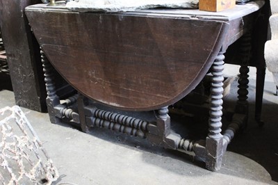 Lot 140 - Antique oak oval dropleaf table on bobbin turned supports 120 cm