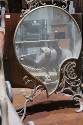 Lot 105 - Continental asymmetric dressings table mirror, in rococo style on scrolled supports, 78cm high