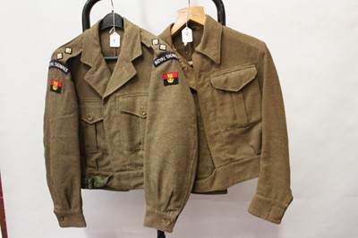 Lot 781 - 1950's British Military Royal Signals Lieutenant's 1949 pattern battledress blouse, dated 1952, with rank insignia and badges, together with a Home Guard Lieutentant's battledress blouse (post war...