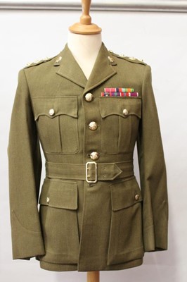 Lot 782 - 1960's British Military Royal Army Service Corps Captain's service dress jacket and trousers, with rank insignia and badges, together with two 1980 pattern British Military No.2 pattern dress jacke...