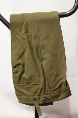 Lot 782 - 1960's British Military Royal Army Service Corps Captain's service dress jacket and trousers, with rank insignia and badges, together with two 1980 pattern British Military No.2 pattern dress jacke...