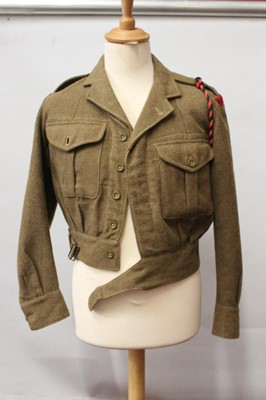 Lot 783 - 1950's British Military Royal Engineers 1949 pattern battledress blouse, dated 1954, with badges, together with another battledress blouse and trousers (3)