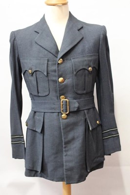 Lot 785 - 1950's Royal Air Force Corporal's Great Coat dated 1952, together with a Royal Air Force service dress jacket and trousers and an Air Training Corps jacket (3)