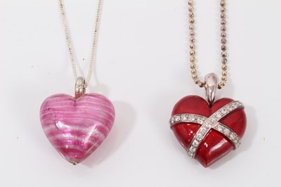 Lot 225 - Silver mounted pink murano glass heart pendant on silver chain and red enamelled heart pendant on silver ball chain (2)