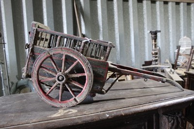 Lot 124 - Old painted wooden model of a hay cart with iron shod wooden wheels 64 cm long