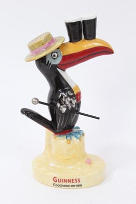 Lot 1291 - Four Royal Doulton limited edition Guinness figures - Big Chief Toucan, MCL 3, Miner Toucan, MCL 10, Seaside Toucan MCL 7 and Christmas Toucan MCL 6