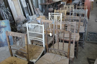 Lot 147 - Collection of Regency painted simulated bamboo chairs mostly with rush seats (13)