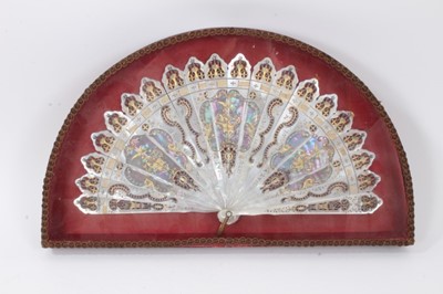 Lot 757 - Fine quality 18th /b19th century Continental mother of pearl and yellow metal mounted fan in glazed case