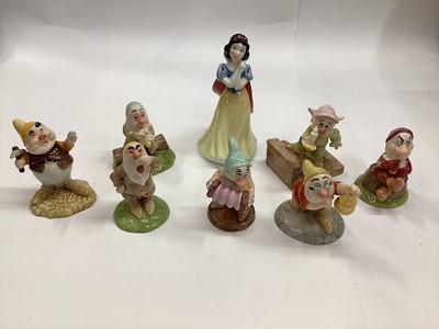 Lot 1302 - Selection of Royal Doulton Snow White and the Seven Dwarfs and Winnie the Pooh figures, all boxed (13)