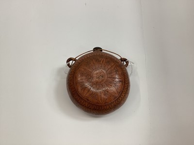 Lot 2733 - 19th century spirit flask made from a gourd with metal mounted cork and woven suspension loops, the surface decorated with scratch engraved floral design and scene of bandits with a dog, signed Aja...