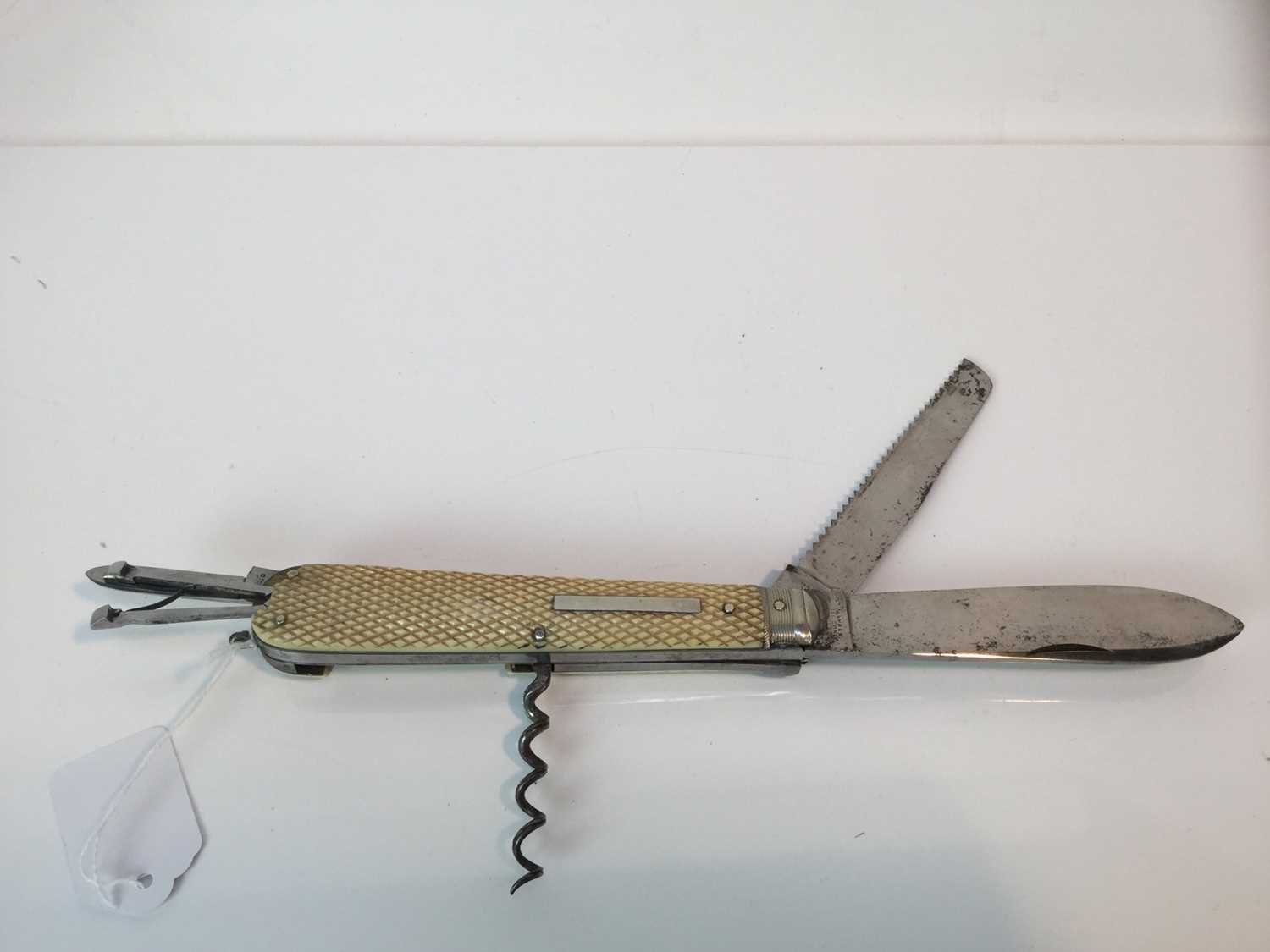 Lot 931 - Fine quality Victorian sportsman’s knife with three cutting blades, corkscrew, spike, scissors, pricker and tweezers, chequered ivory scales, eared spring lock release and suspension ring, blades s...