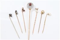 Lot 702 - Group of seven antique stick pins - to include...