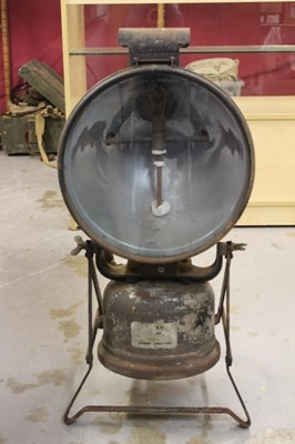 Lot 801 - Second World War floodlight projector lamp on pivoting stand, by Tilley, Hendon, approximately 76cm in height.