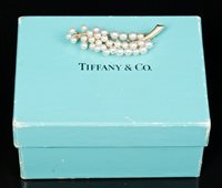 Lot 711 - Tiffany gold and cultured pearl brooch, the...