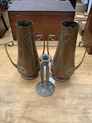 Lot 2678 - Pair Art Nouveau copper and brass vases, together with an Arts & Crafts metal candlestick (3)