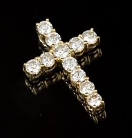 Lot 712 - Diamond cross pendant - comprising eleven...