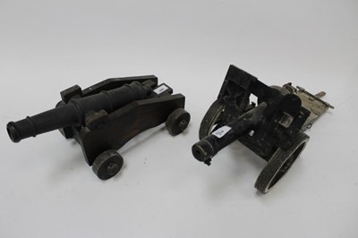 Lot 920 - Decorative model of a signalling type cannon on wooden carriage, together with an unusual scratch built model of a cannon (2)