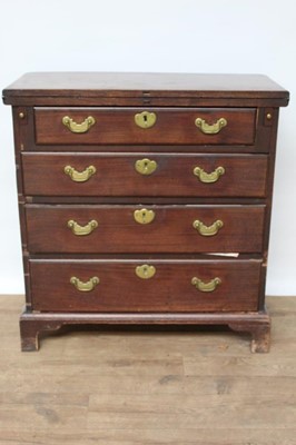 Lot 1403 - Good George II mahogany bachelor’s chest with fold-over top, four long 
graduated drawers with original brass handles on bracket feet