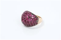 Lot 714 - Art Deco cocktail ring of bombe form, with...