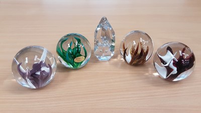 Lot 1041 - Five Wedgwood paperweights, circa 1970s, four sea fern and one clear Galaxy (5)