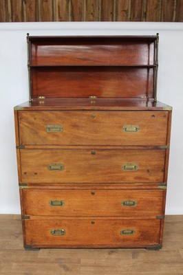 Lot 1405 - Unusual 19th century mahogany military campaign chest in two 
sections, with hinged top forming a two-tiered shelved back, fitted 
secretaire drawer and three drawers below