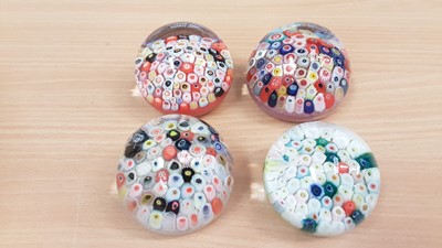 Lot 1052 - Four Strathearn end of day carpet paperweights circa. 1970s (4)