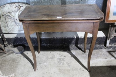 Lot 209 - 18th century French chestnut tea table, with fold over top and rear drawer on cabriole legs, 82cm wide x 43cm deep x 72cm high